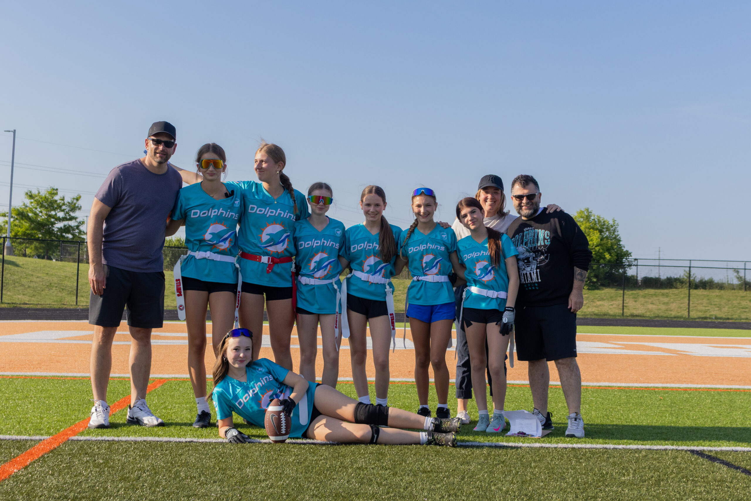 BMFA flag athletes celebrating on the field.